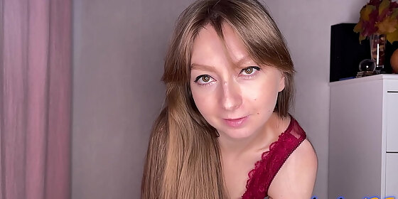 a girl in a red negligee passionately masturbates