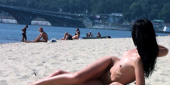 skinny nude beach girl filmed on a video by a voyeur