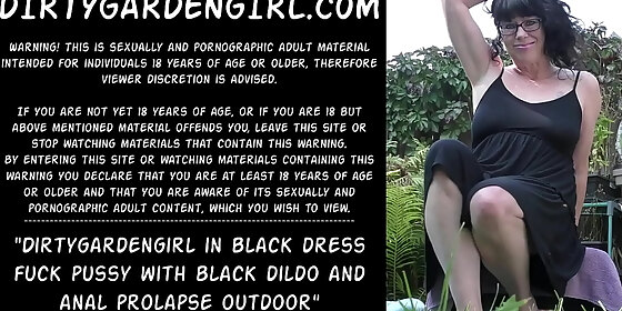 dirtygardengirl in black dress fuck pussy with black dildo and anal prolapse outdoor