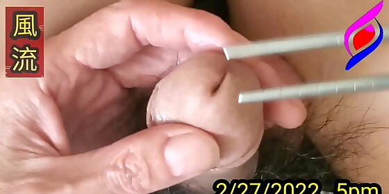 stroking the head of the penis