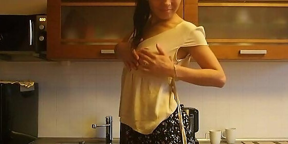 teasing session in the kitchen with a babe