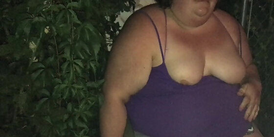 smoking fat girl flashes boobs outside