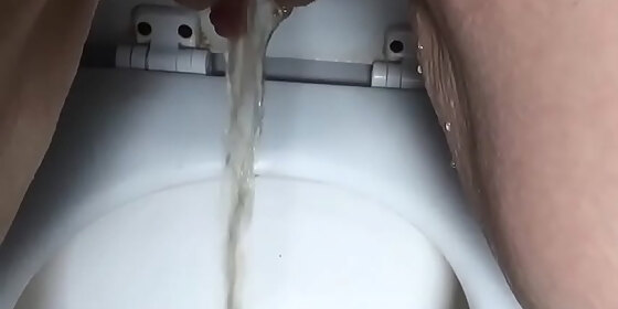 stare at my pretty feet and pussy while on toilet