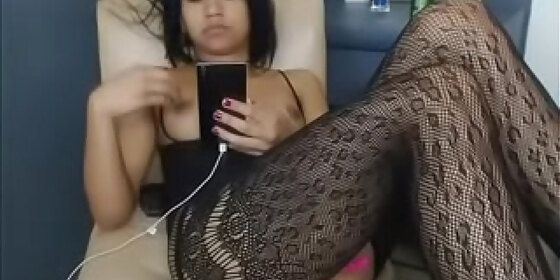 asian girl in black fishnets chats and shows her sexy body