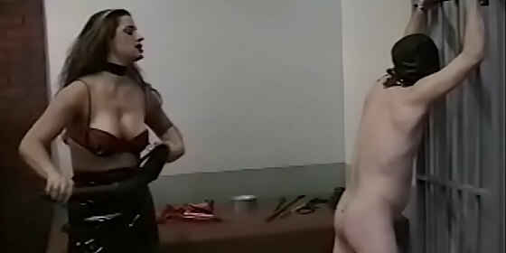 sexy brunette interrogates a loser with her special bdsm technique