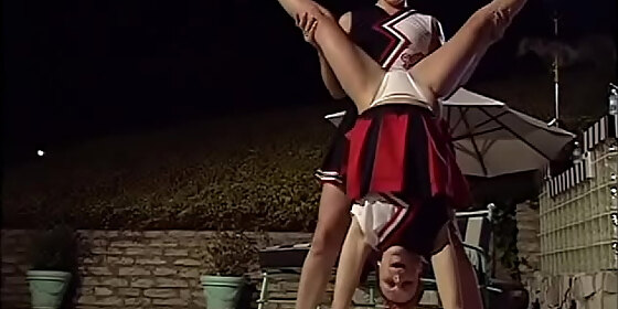 two cheerleaders enjoy in swim pool with each other s tits and pussies