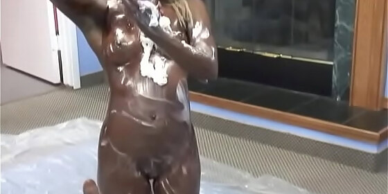 hot black chick shoves banana up her shaved pussy