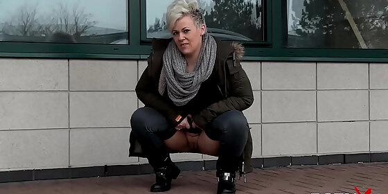 chesty mature bree pissing in the public