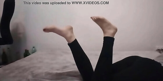 she is playing with her legs miley grey