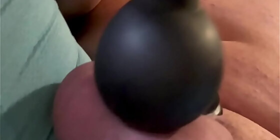 mr cage has a tiny chastity on watch how much cum he has using a hitachi