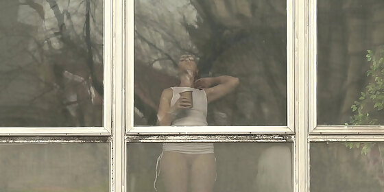 jeny smith teasing the strangers thru the window