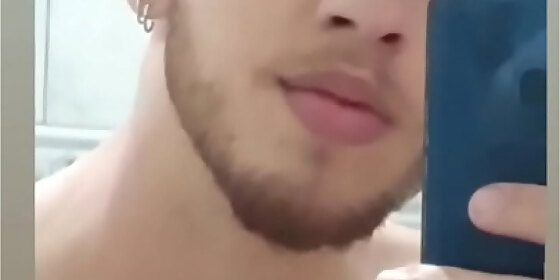 young man showing off in the bathroom