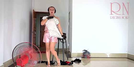 the chick is going to the resort trying on linen and dresses 1