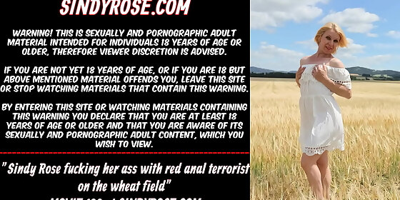 sindy rose fucking her ass with red anal terrorist on the wheat field