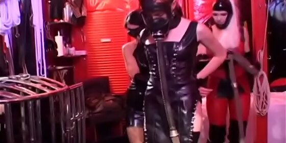 couple of strict female dominatrixes are doing their girl in the cell