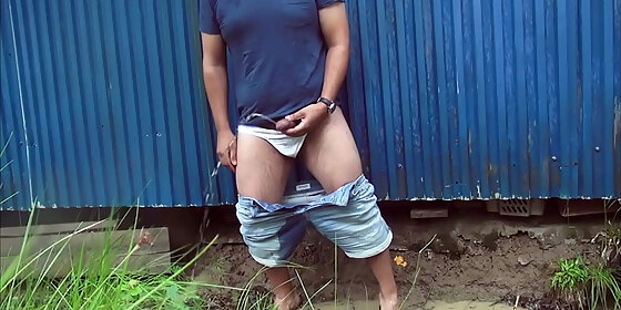 can t get my cock out in time peeing my shorts in a storm