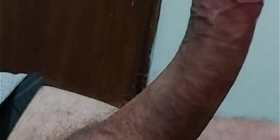 hairy big cock of the pink head throbbing with horn