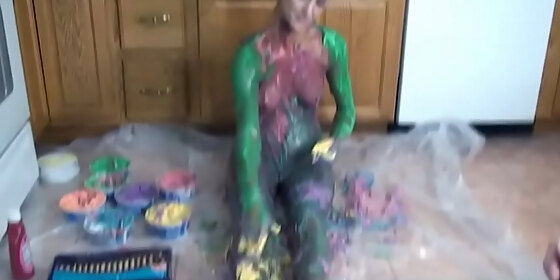sexy housewife gets naked and paints her body