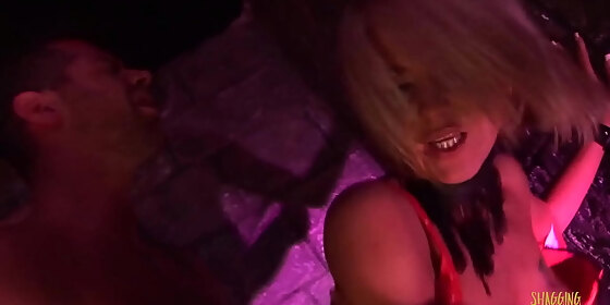 after being blindfolded in the dungeon a blonde milf with fake boobs surprises him with a bj