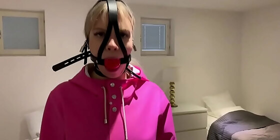 vanessa in heavy rainwear and gag