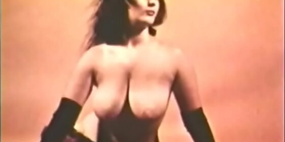 classic babe in sexy black gloves filming retro 50s clip