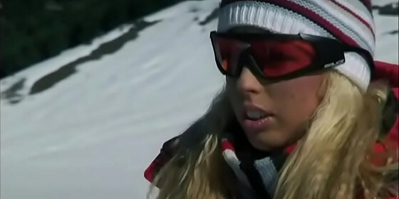diana gold screws two skiers in the snow before getting a stand up dp