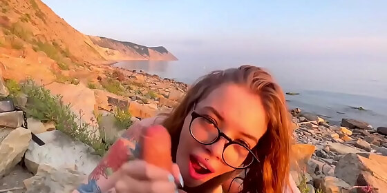 cute girl with glasses sucks cock while no one is watching